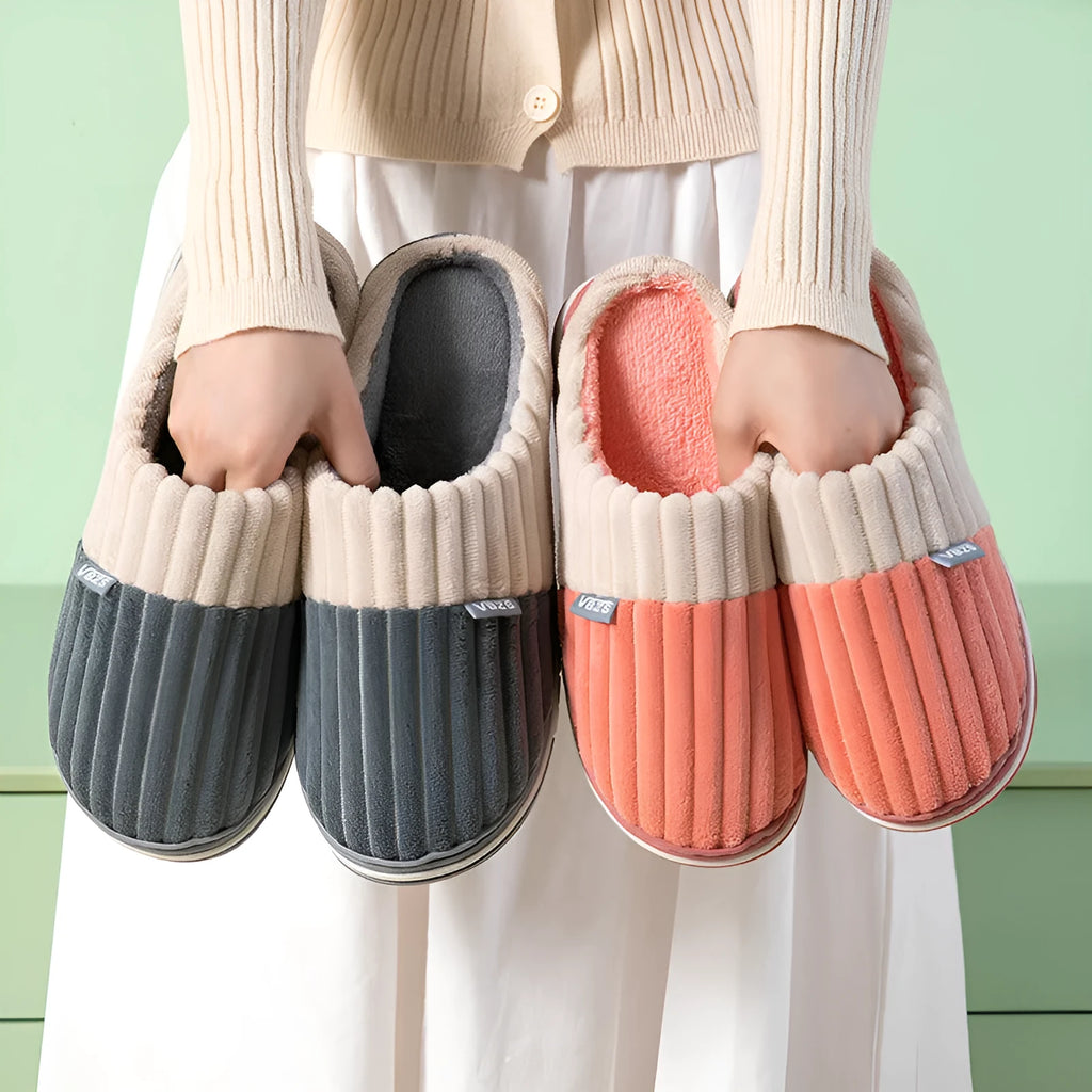 Unisex winter slippers in candy colour, suede upper, TPR sole, Baotou style, on a clean background.