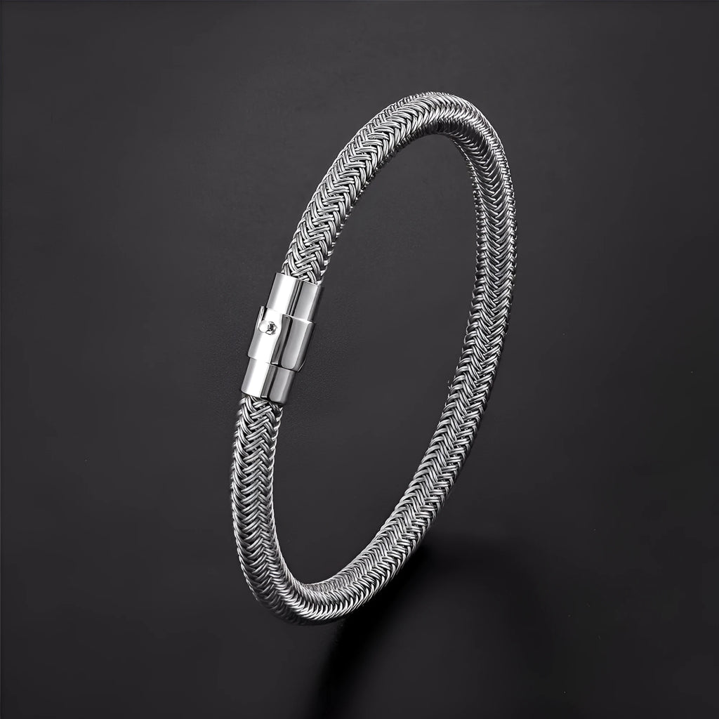 Titanium steel geometric wire bracelet with a magnetic clasp shown in one of four colour options.