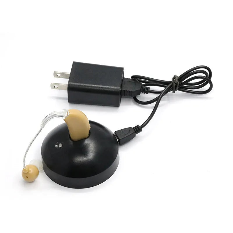 Black rechargeable hearing aid amplifier with silicone housing and charging cable
