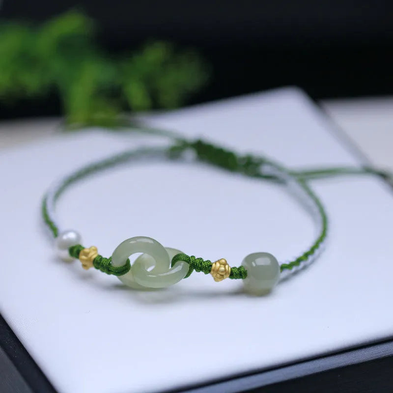 Natural Hetian jade woven bracelet with flexible wire construction and hollow out design