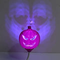 USB-powered pumpkin decorative lamp showing purple or yellow light options