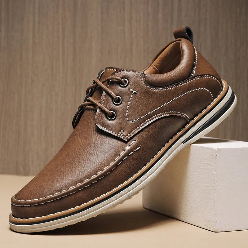 Men's black genuine leather casual shoes with round toe and front lace-up design