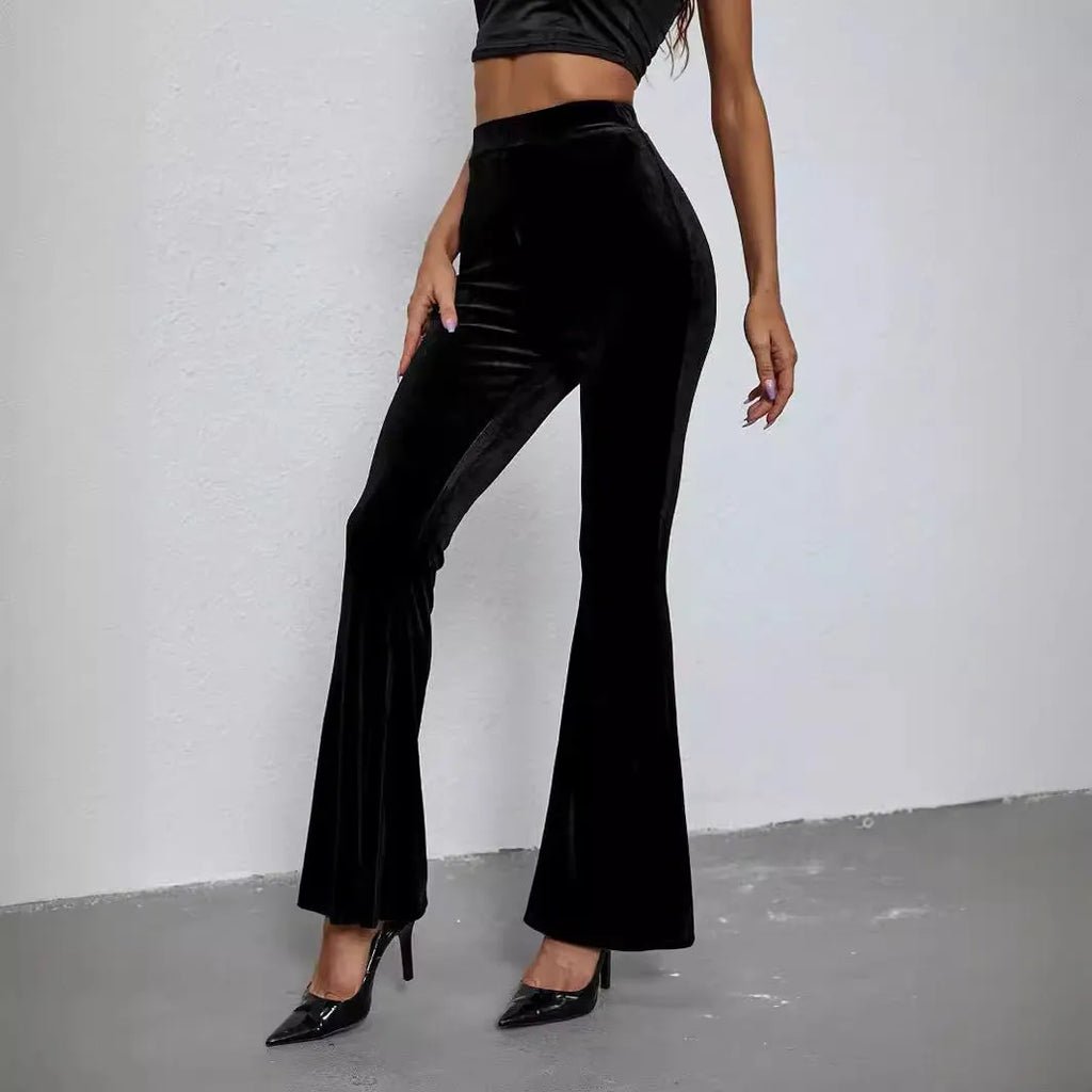 Black high-waist flared corduroy trousers for women with slim fit and slightly elastic fabric