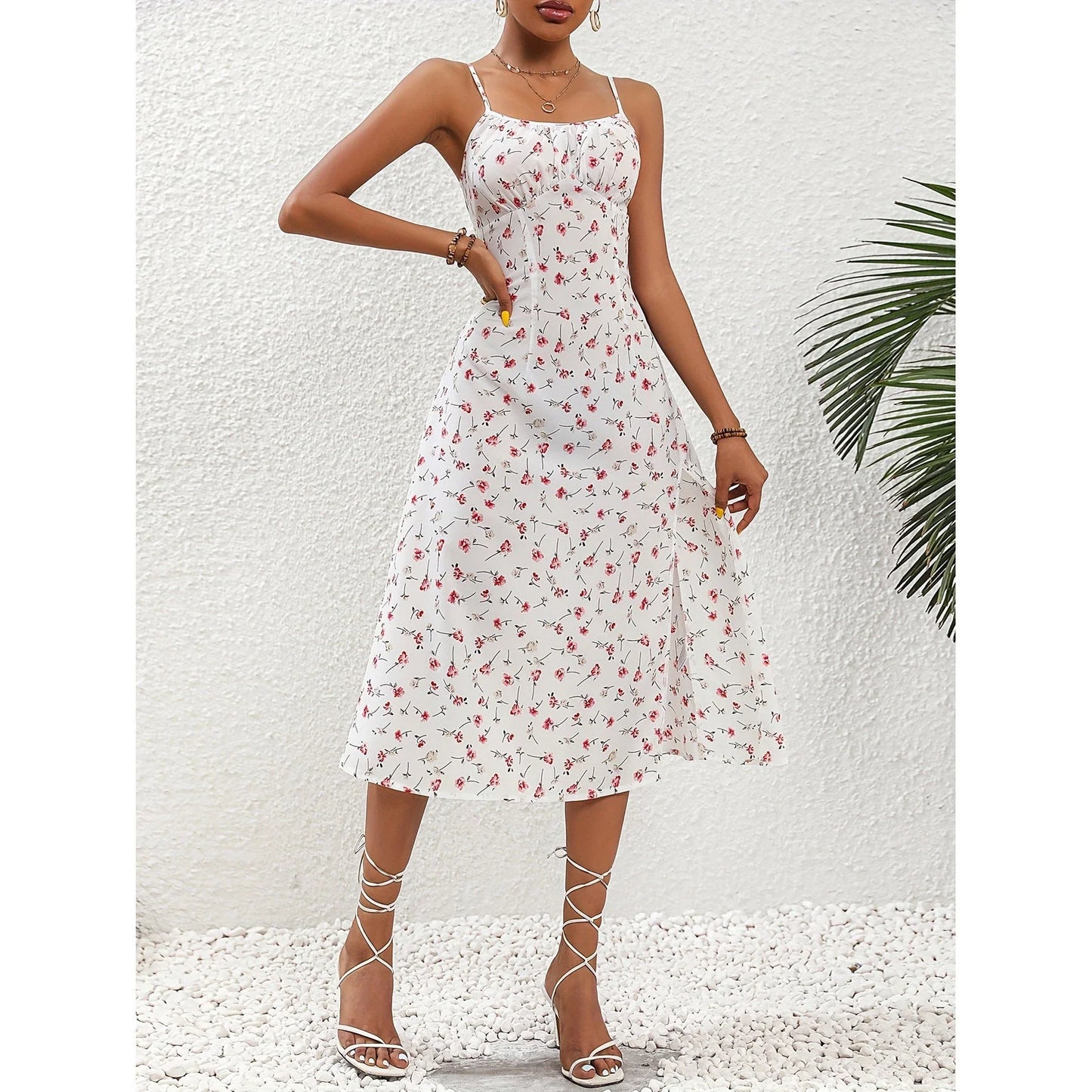 Stylish women's polka dot suspender dress with a sexy slit, perfect for summer outings.