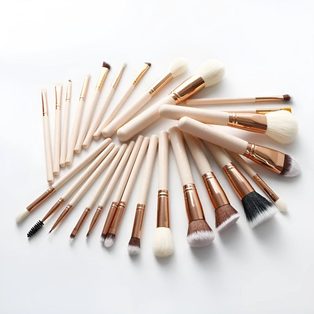 26-piece pink makeup brush set with wooden handles displayed in a PU storage bag