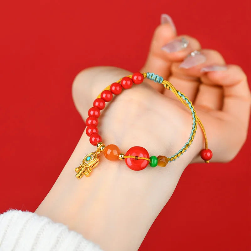 Emperor red sand cinnabar peace buckle bracelet with hand-woven geometric design