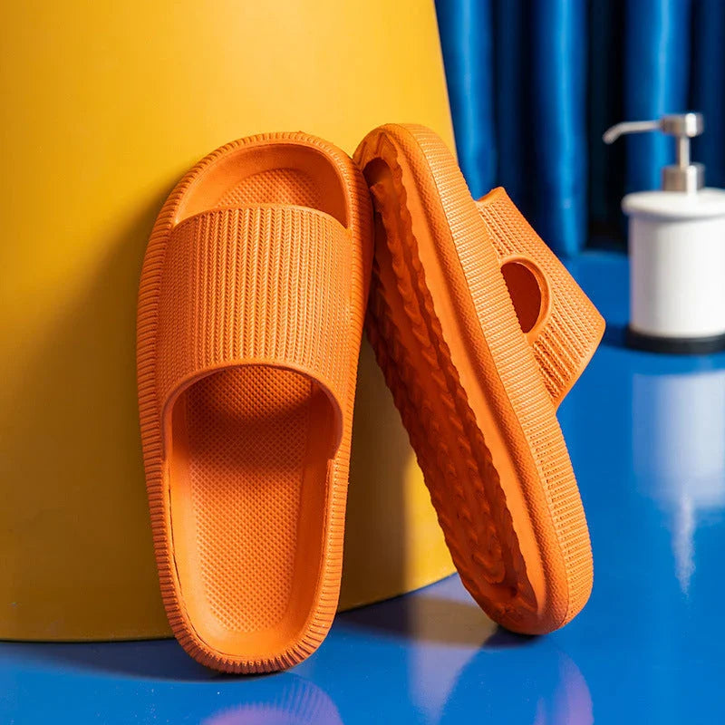 Stylish and comfortable EVA bathroom slippers with soft cushioned soles and anti-slip design, available in a variety of vibrant colors.