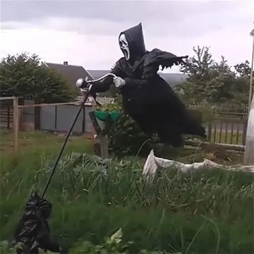 Plastic skeleton scarecrow Halloween decoration with screaming skull design