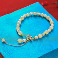 Natural Hetian jade pearl pendant women's bracelet with gold alloy electroplated finish in Chinese style