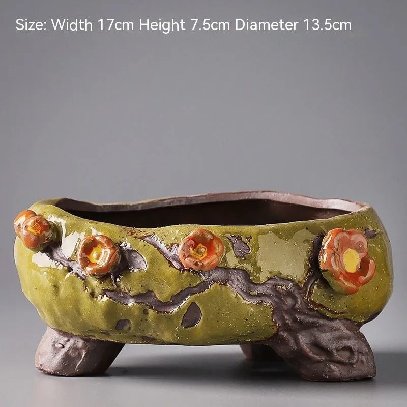 Hand-painted ceramic flower pot with pastoral design and large planting area