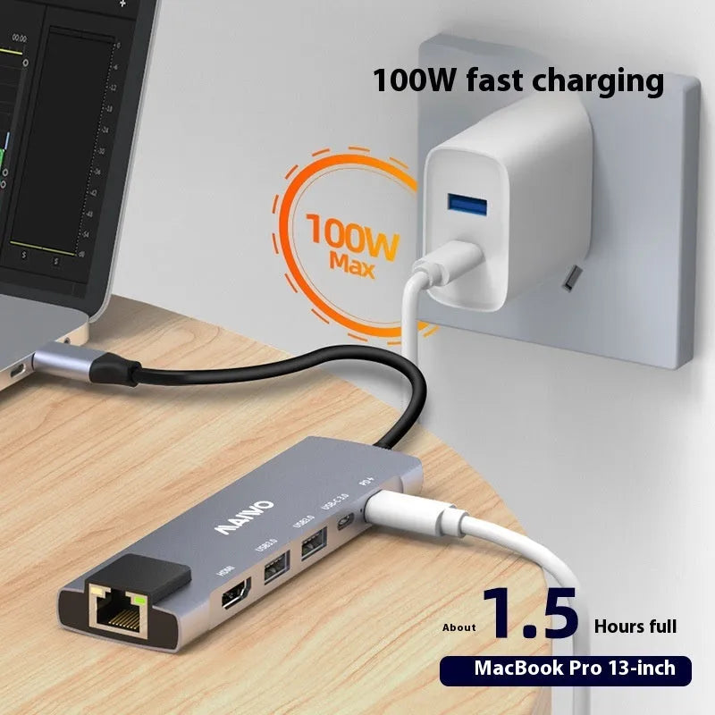 Aluminium alloy Steam Deck six-in-one docking station with USB-C cable and labelled ports for HDMI, Ethernet, and USB.