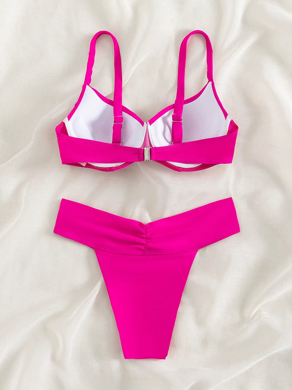 Solid colour bikini swimsuit in briefs style on a mannequin, showing the sleeveless bra and panty.