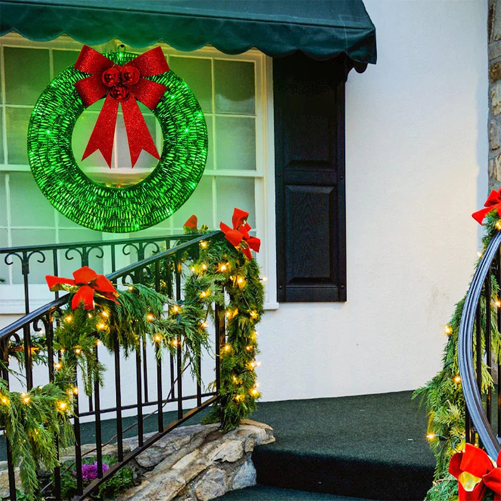 Festive 20-inch luminous LED Christmas wreath with gold and green tinsel garland and large bow