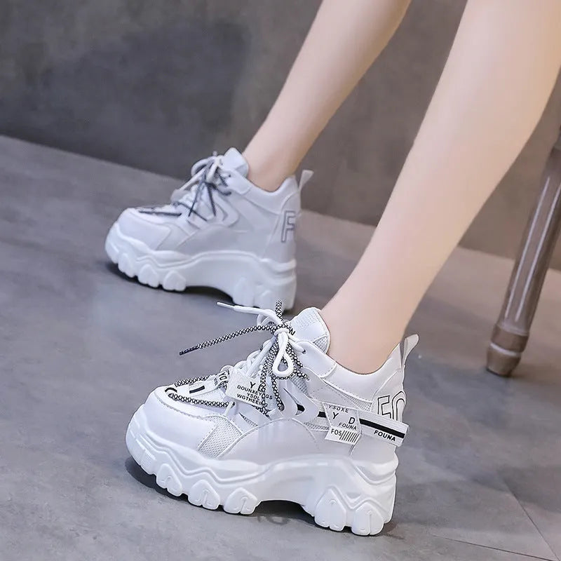 Women's white mesh platform shoes with cross strap and 6-8cm rubber sole heel.