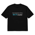Man wearing a black loose-fit t-shirt with a large 3D digital printed cartoon design on the front.