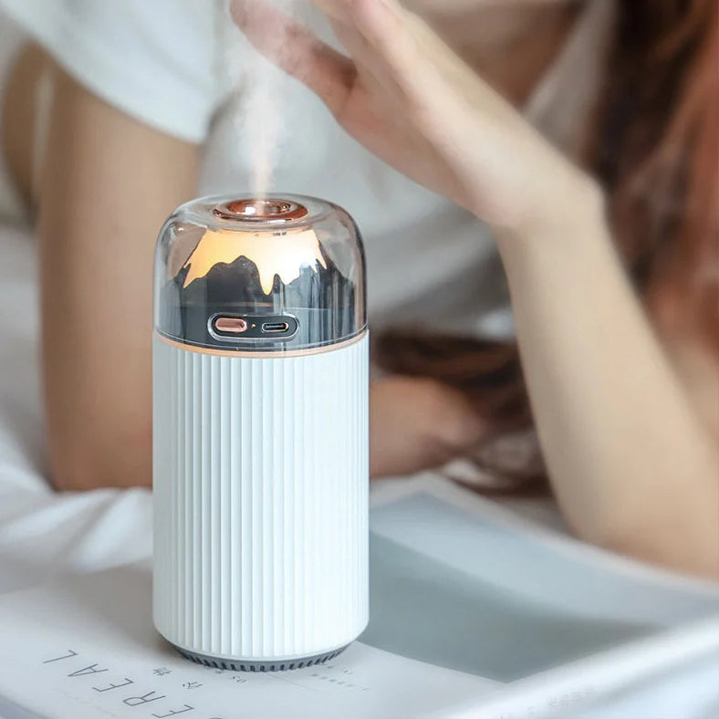 Round white car humidifier with USB cable, showing 80mm diameter and 166mm height dimensions