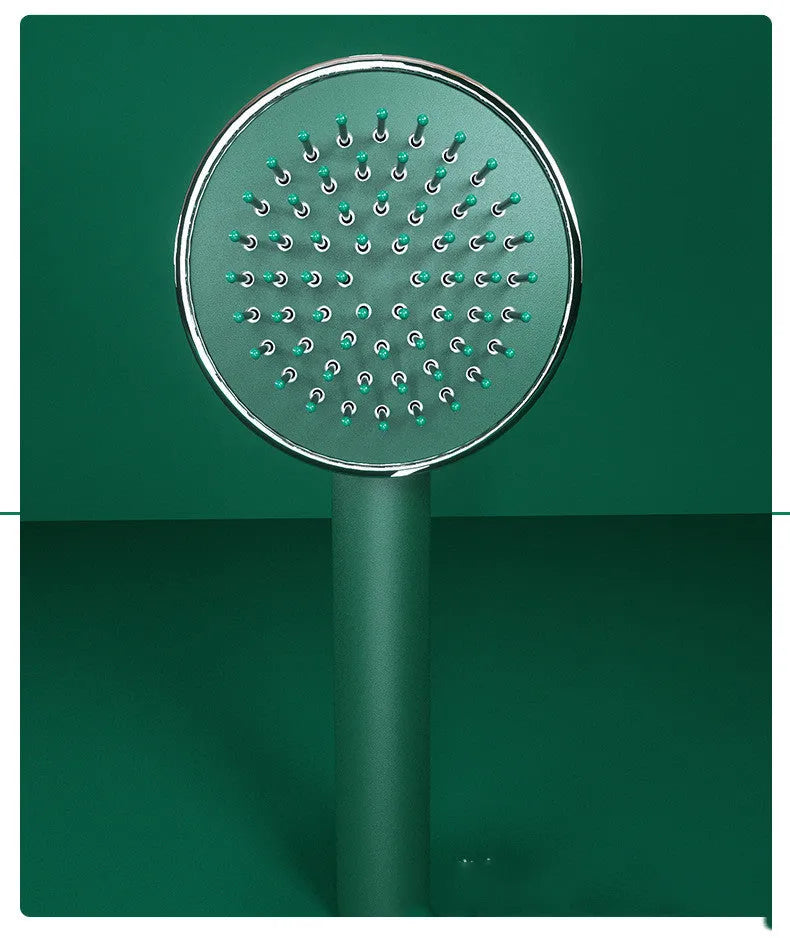 Long handle air cushion comb in green with plastic body for hair styling