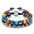 Manually crafted cat's eye bracelet with auspicious elephant elements and alloy construction