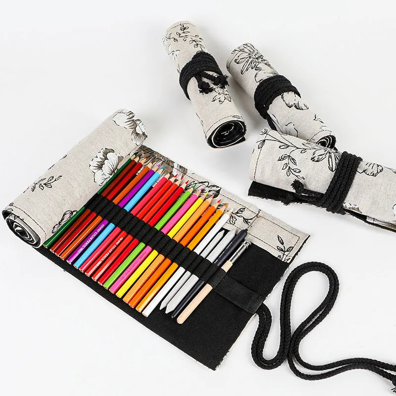 Black peony floral print pencil roll bag open to show multiple pencil slots.