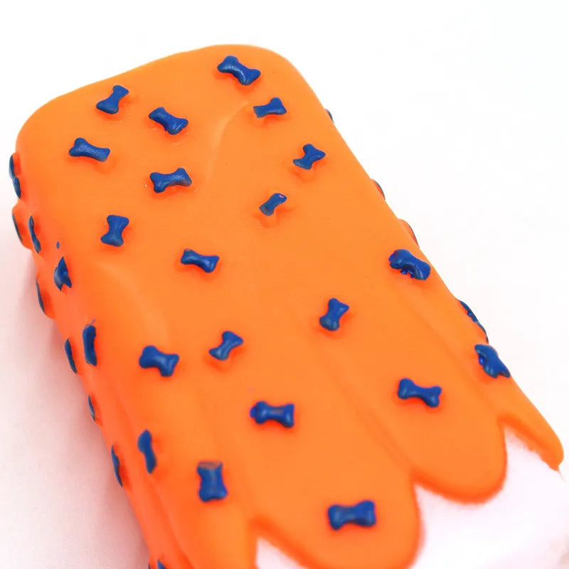 Dog vinyl simulation popsicle ice cream chew toy in random colour, measures 15x6cm.