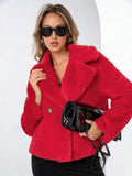 Women's loose short faux fur coat in rose red, shown on a model.