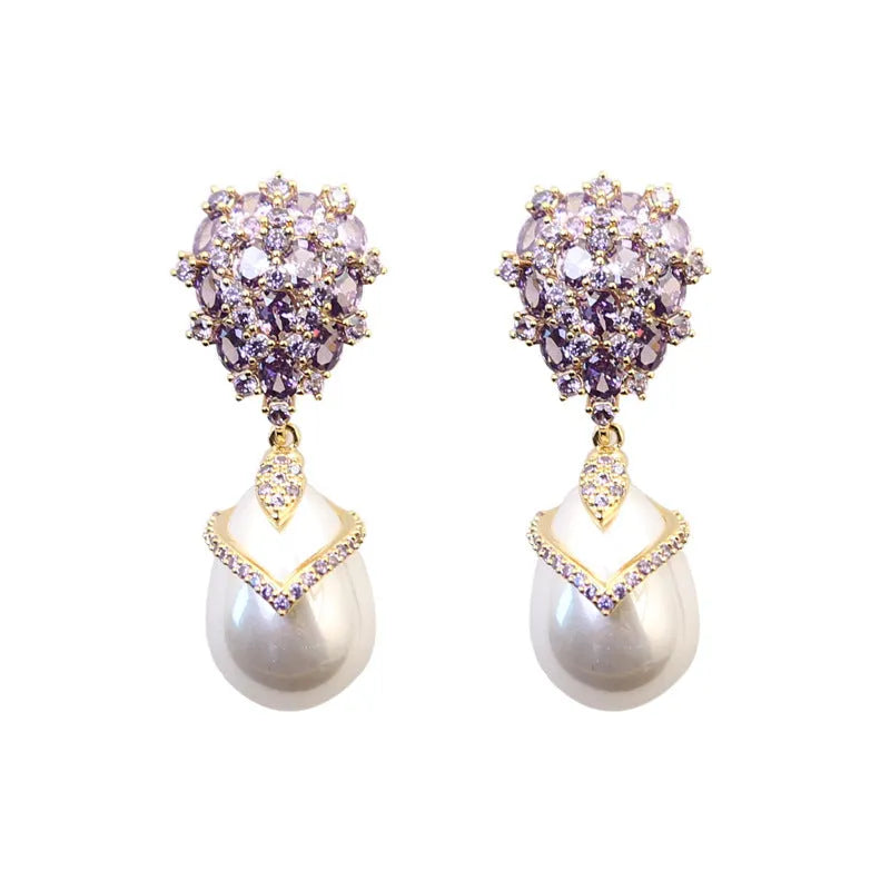 Women's drop-shaped pearl earrings with gemstone inlay in three colour variations