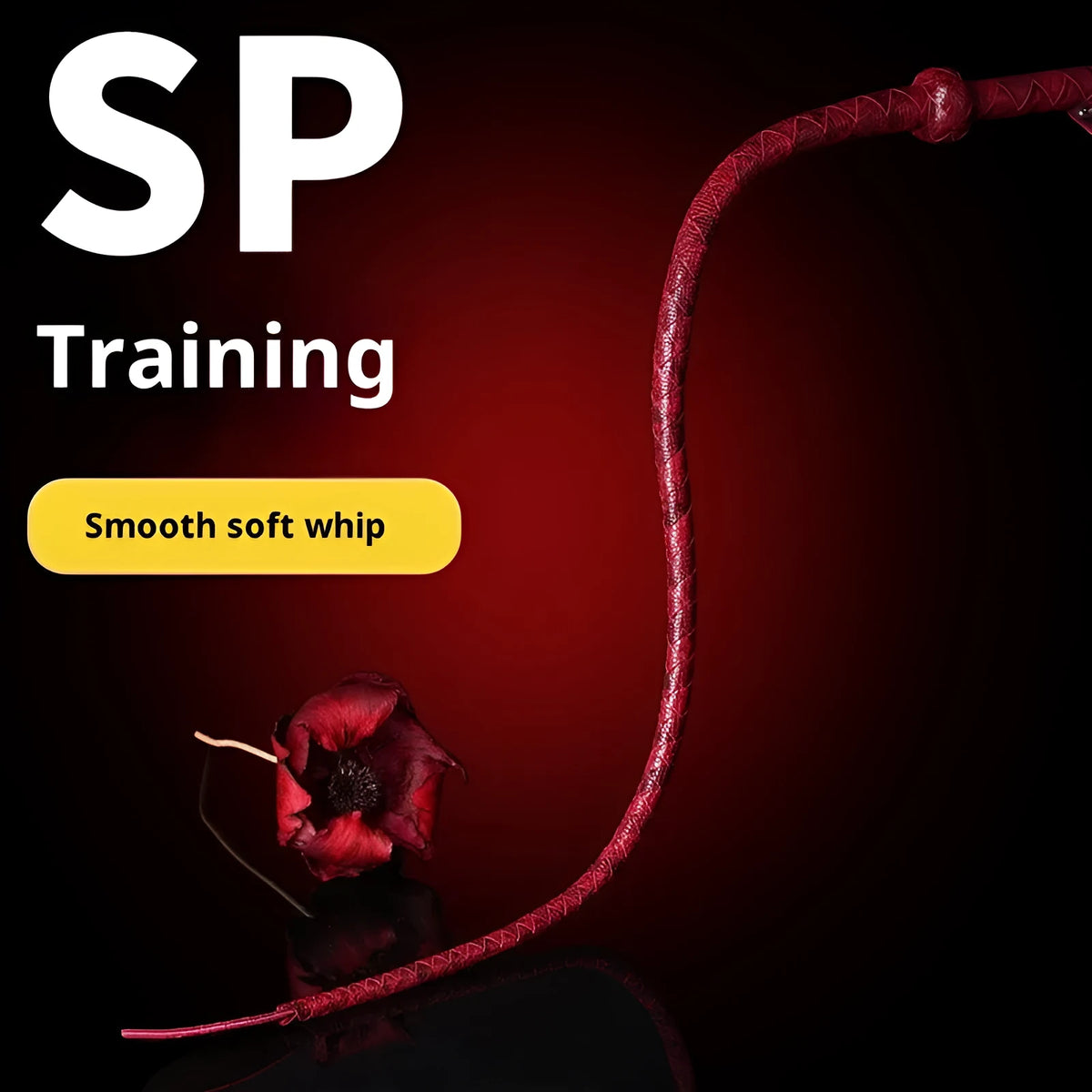 Red PU willow leaf whip for BDSM training and role play, lying on a surface.