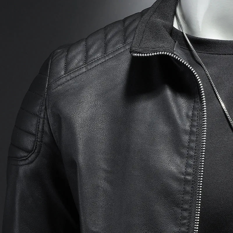 Men's black leather motorcycle jacket with stand collar and zipper front on display