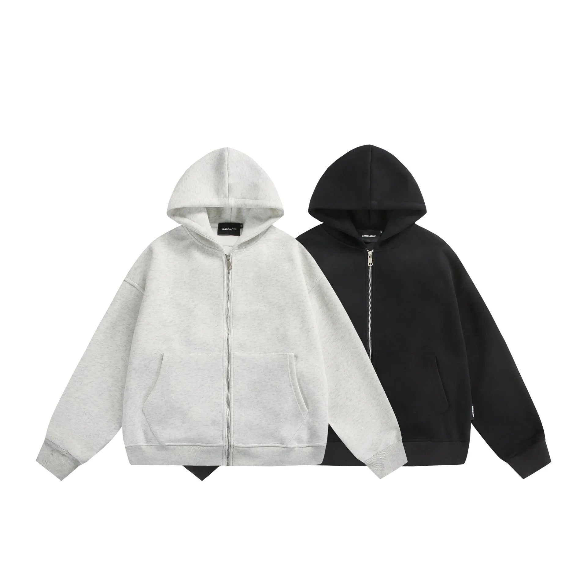 Cotton blend loose fit cardigan coat with a small bag on the back, shown in black.