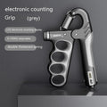 Adjustable electronic count spring grip with digital display in orange, red or grey colour options