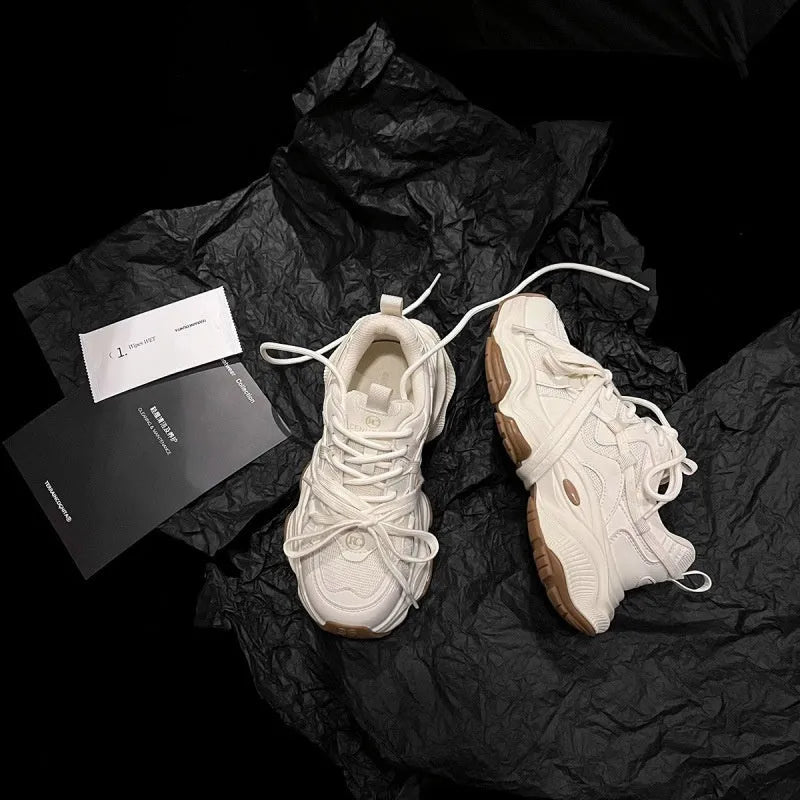 Women's milky white platform sneakers with lace-up front and round toe.