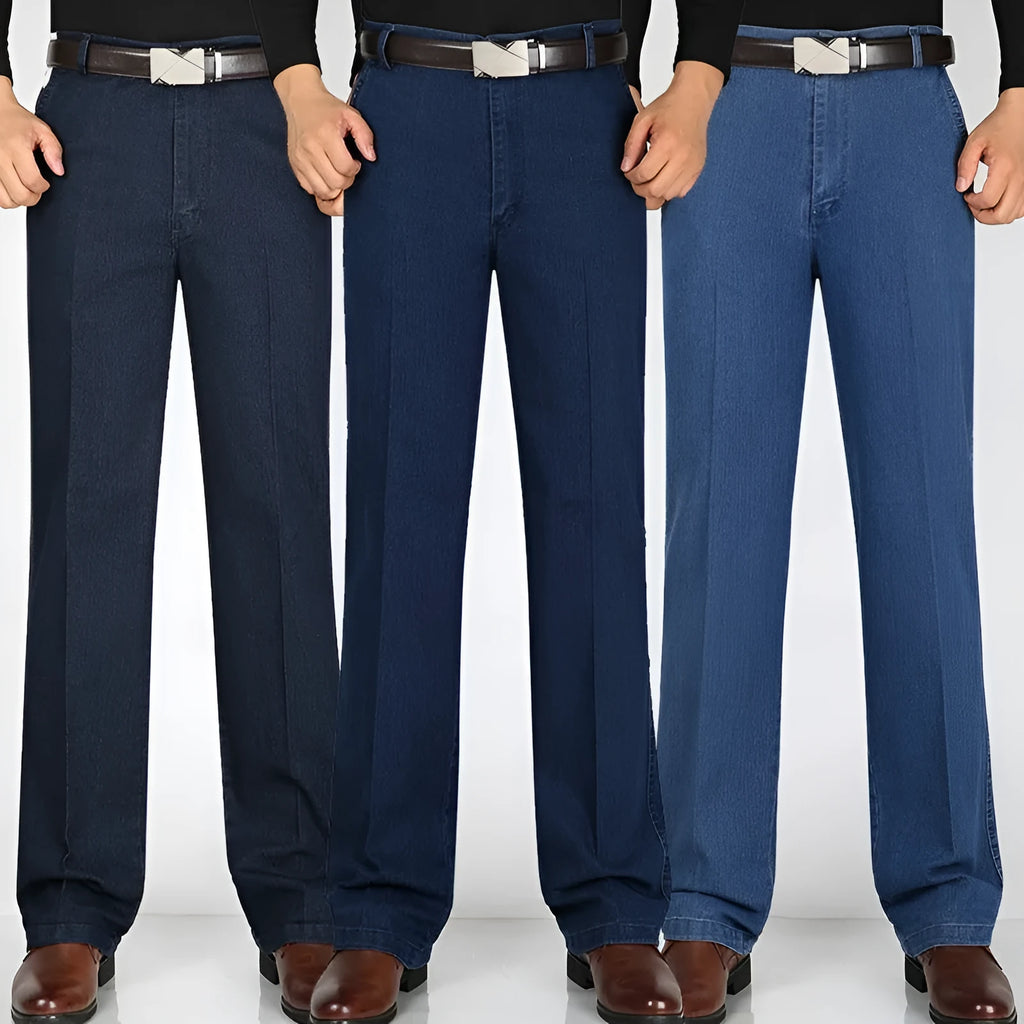 Men's high-waist loose-fit blue denim jeans on a hanger, showing the zip fly and relaxed leg cut.