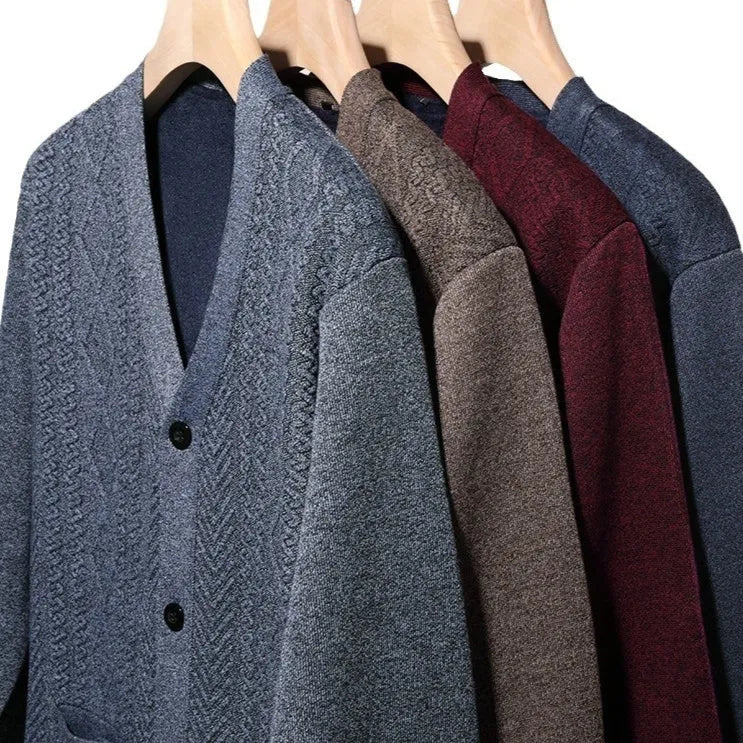 Man wearing a brown striped cardigan sweater with a wool lining, button front and long sleeves.
