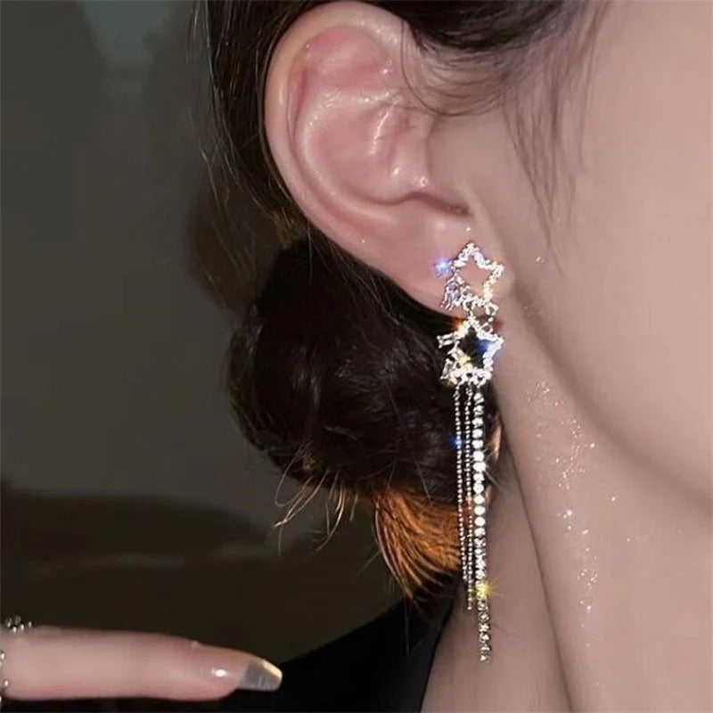XINGX Water Drop Tassel Earrings in gold alloy with geometric design