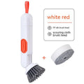 White and red long-handle kitchen cleaning brush with integrated soap dispenser button and two brush heads.