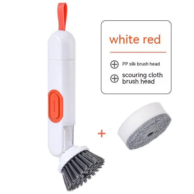 White and red long-handle kitchen cleaning brush with integrated soap dispenser button and two brush heads.
