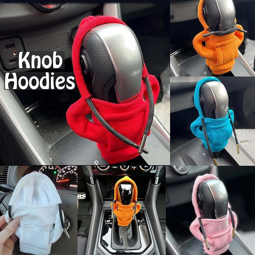 Blue cloth gear shift knob hoodie cover shown on a car gear lever.