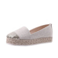 Black plus size breathable canvas flat shoe with round toe and slip-on design.