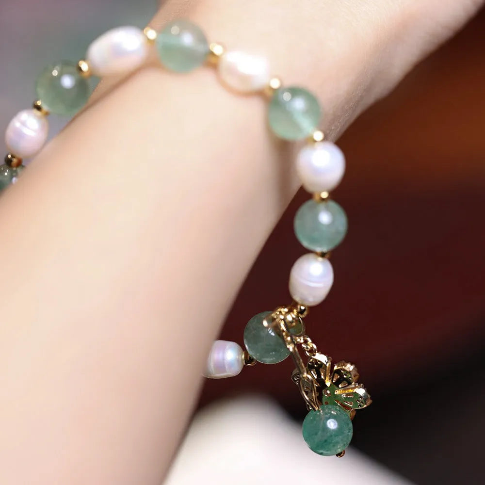 Green strawberry freshwater pearl bracelet with Chinese geometric patterns and peace buckle clasp