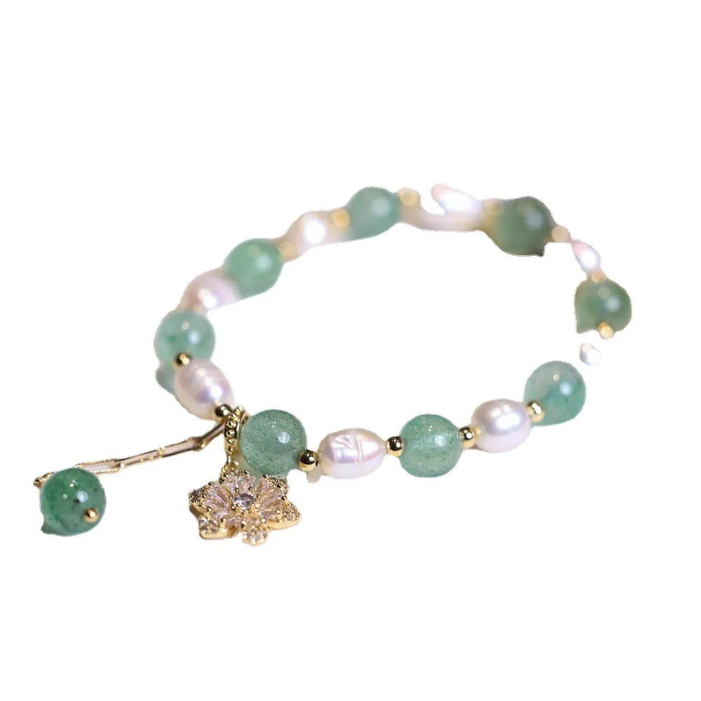 Green strawberry freshwater pearl bracelet with Chinese geometric patterns and peace buckle clasp