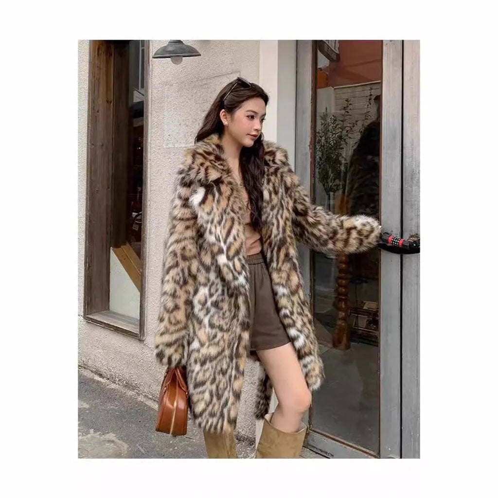 Faux fur street fashion coat with fur collar in long style with regular sleeves and pockets