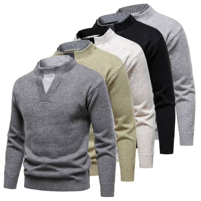 American retro fake two-piece V-neck dotted sweater in beige with batwing sleeve on a model