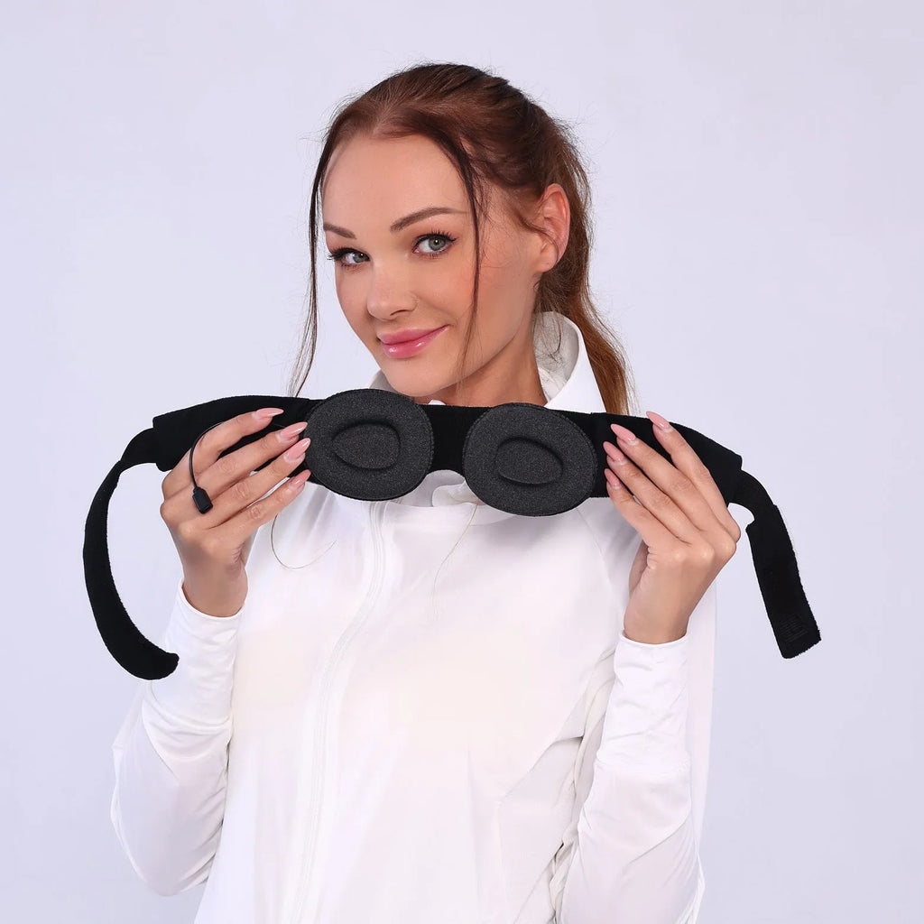 Grey contour Bluetooth sleeping eye mask with built-in speakers for wireless music playback.