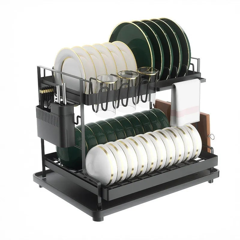 White double-layer metal kitchen draining rack with a removable top tray on a countertop.
