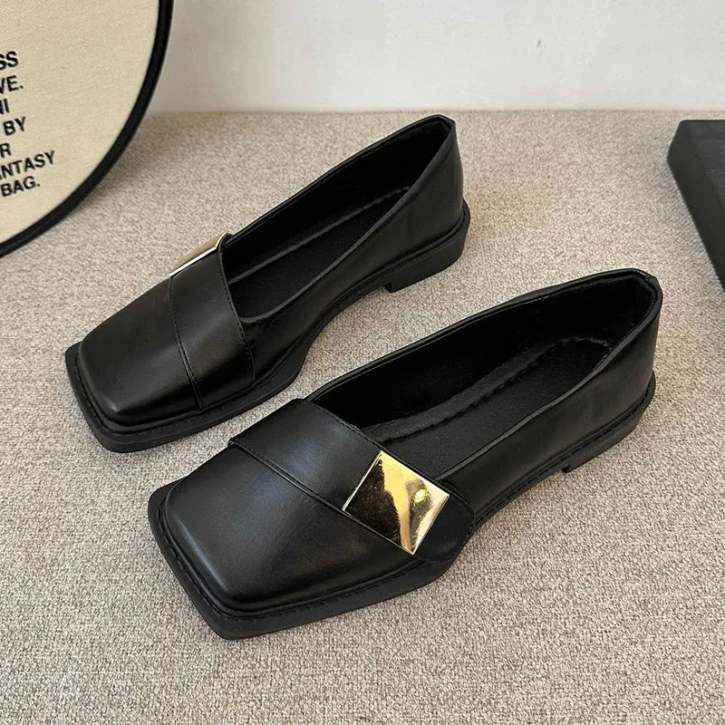 Beige women's square toe flat slip-on shoes with a metal buckle and low square heel.