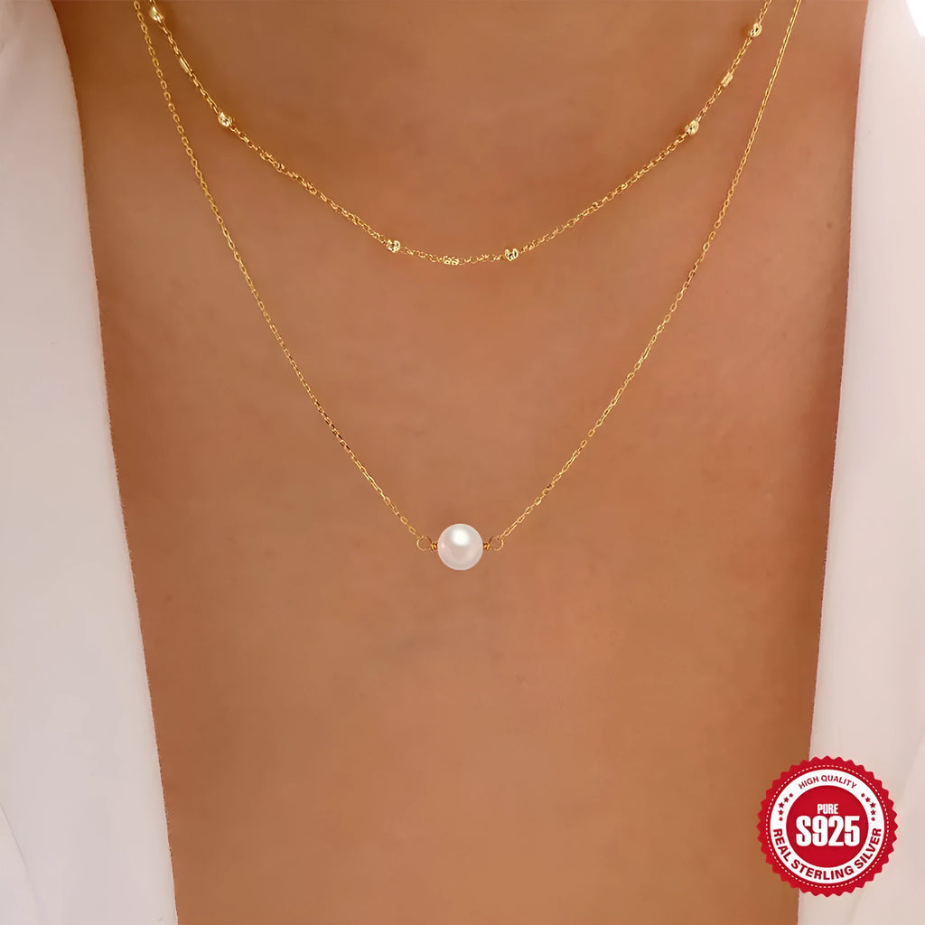 S925 sterling silver necklace with double-layer twin pearl pendant on a ball bead chain, shown in gold colour.