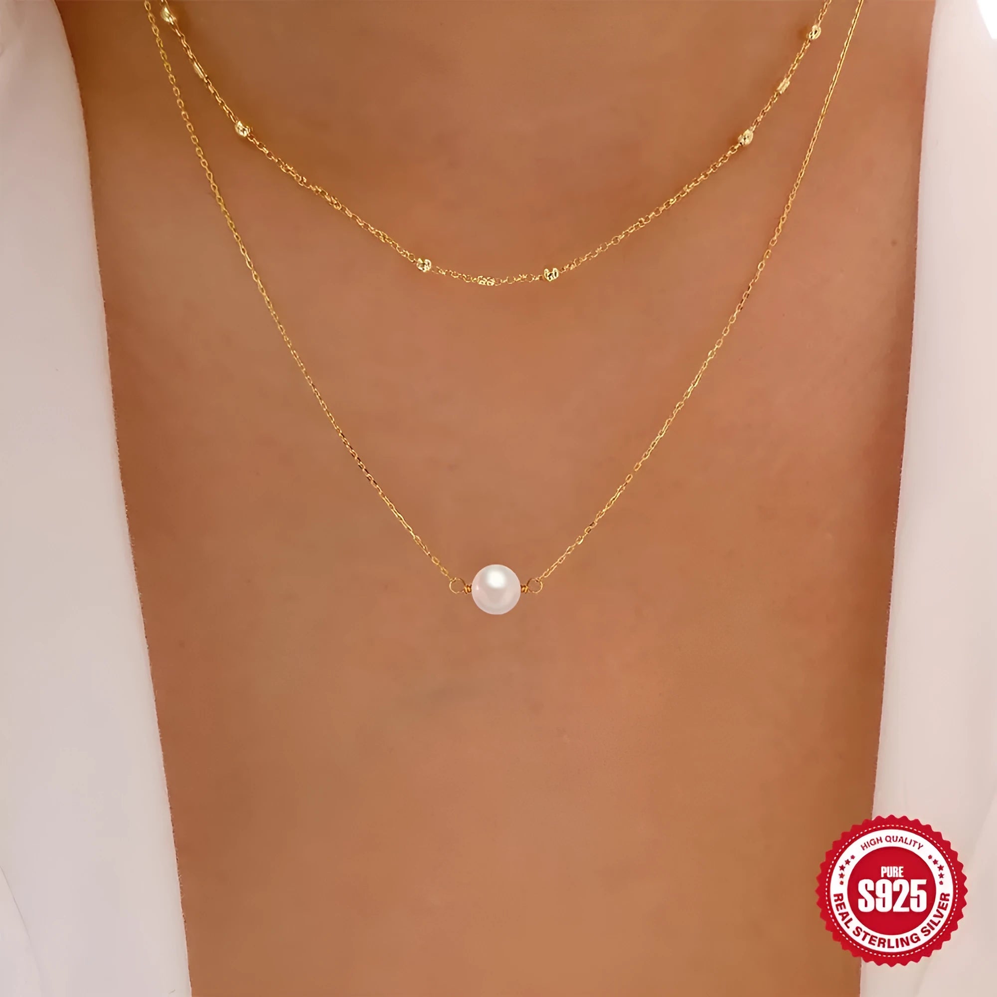 S925 sterling silver necklace with double-layer twin pearl pendant on a ball bead chain, shown in gold colour.