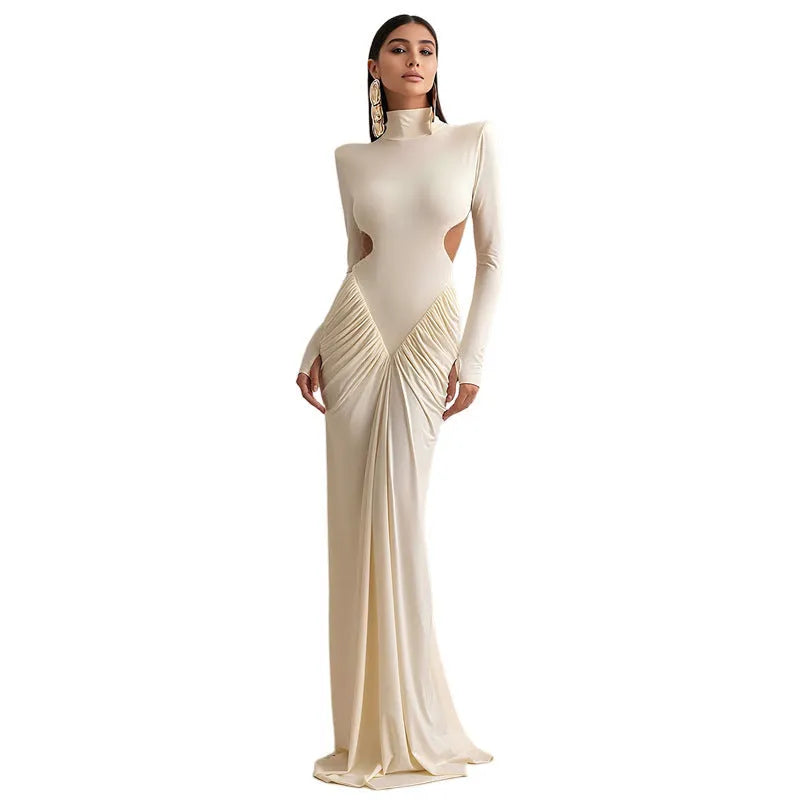 Women's light apricot high collar long sleeve pleated backless slim fit dress on a model.