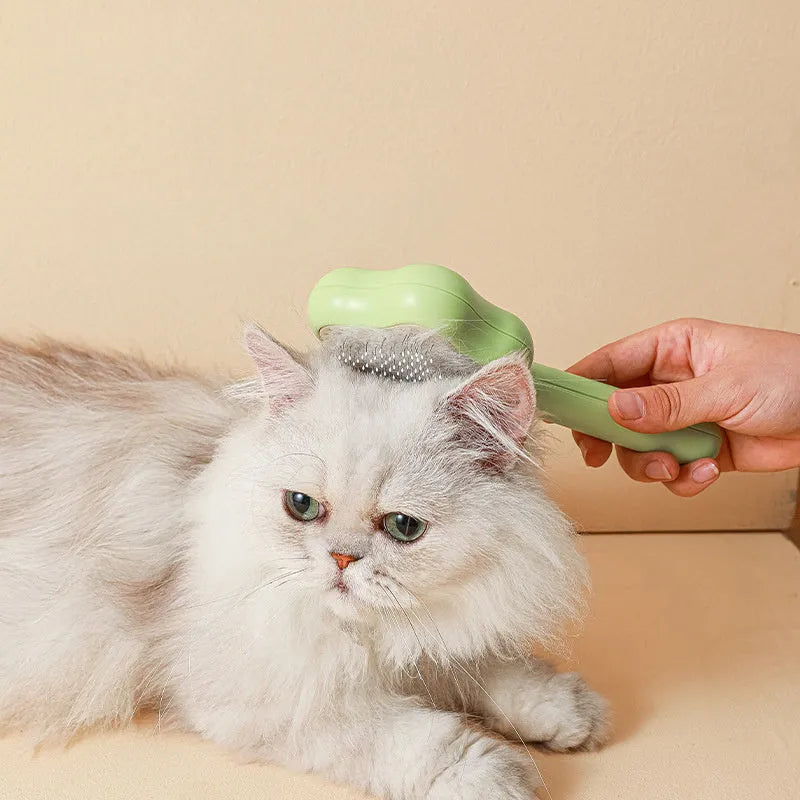 Green stainless steel cat grooming comb with four different needle surfaces for pet hair removal