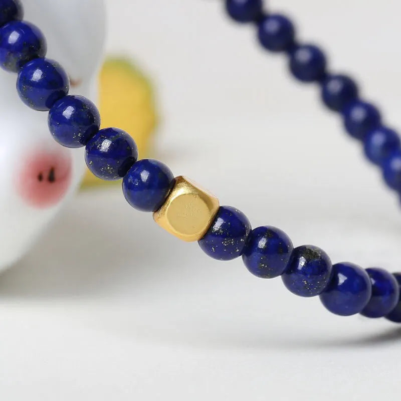 Natural crystal green and gold stone geometric bracelet with 16mm bead and electroplated finish.